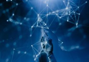 AI-Demystified_-What-to-Know-About-the-Current-Tools-on-the-Market-in-2025-scaled.jpg Free A robotic hand reaching into a digital network on a blue background, symbolizing AI technology. Stock Photo